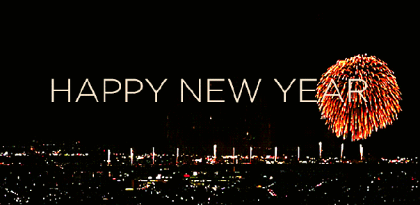 happy-new-year-colorful-fireworks-over-city-animated-gif